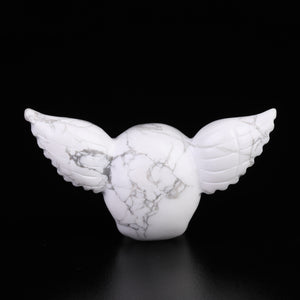 white turquoise skull with wings